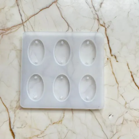 6 cavity oval Rakhi mould